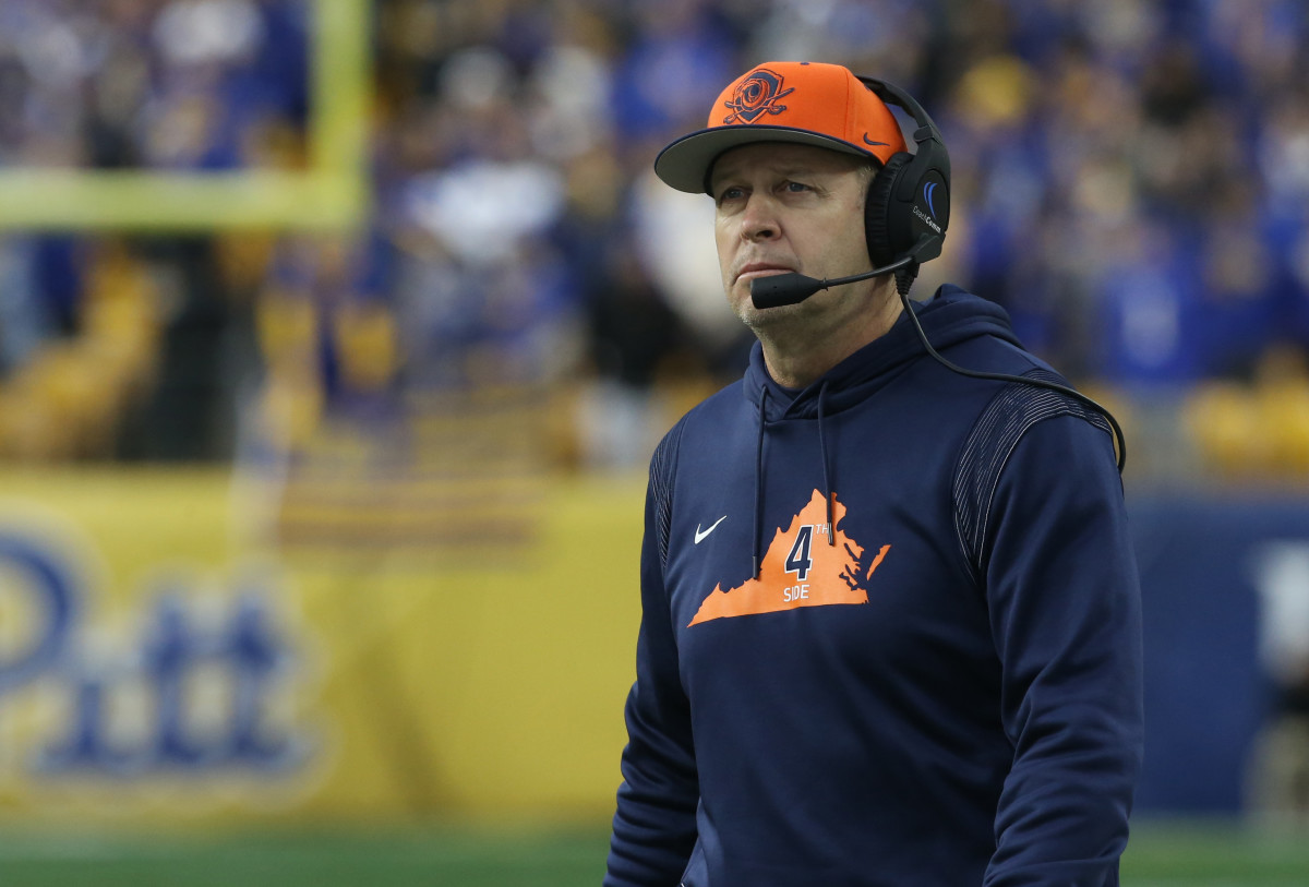 Nov 20, 2021; Pittsburgh, Pennsylvania, USA; Virginia Cavaliers head coach Bronco Mendenhall looks on from the sidelines against the Pittsburgh Panthers during the second quarter at Heinz Field. Mandatory Credit: Charles LeClaire-USA TODAY Sports